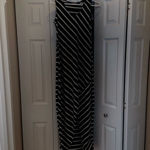 Slit up the front, black and white dress is perfect for summer.